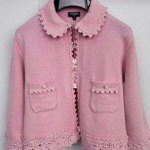 Chanel Knit separate blazer goes with bow blouse.